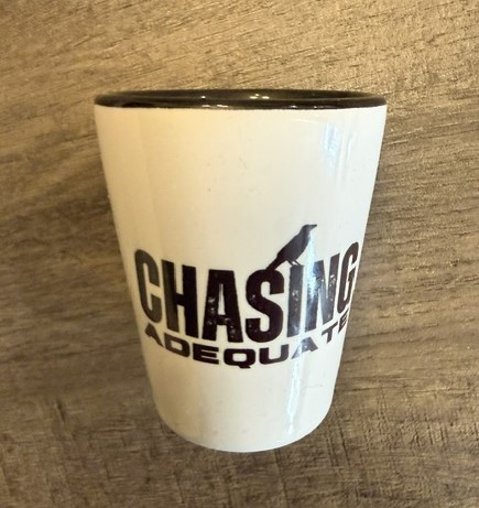 Chasing Adequate shot glass